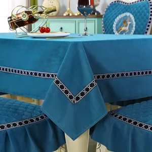 European velvet tablecloth and dining chair cover set with elegant embroidered stripe details.