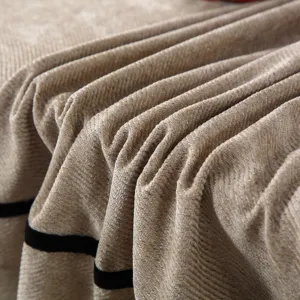 Detailed view of striped dining chair cover fabric, soft textured material for home decor.