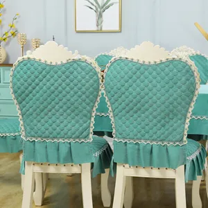 European dining chair cover set, quilted teal fabric with delicate lace and elegant ruffled skirt.