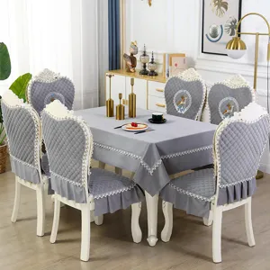 European style dining chair cover set with quilted grey fabric, lace trim and deer embroidery.