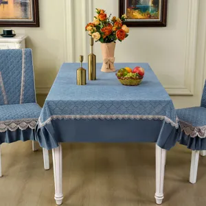 Blue tablecloth and dining chair cover set with elegant lace trim for home decor.