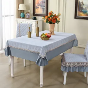 Elegant dining table cloth and matching chair cover set with delicate lace border for home decor.