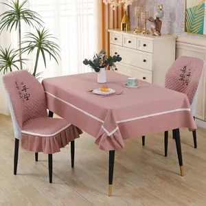 Pink elastic tablecloth and dining chair cover set with elegant Chinese embroidery details.