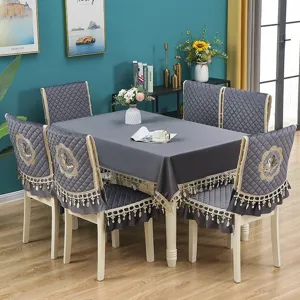 Grey velvet dining table cloth and chair cover set with exquisite swan embroidery and fringe.