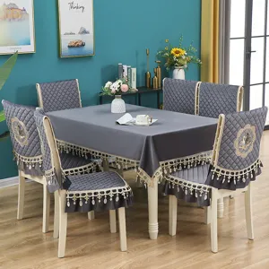 Italian velvet dining chair covers and tablecloth set with elegant lace embroidery and quilted design.