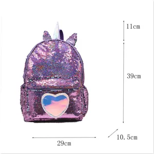 Detail view of purple unicorn sequin backpack with heart motif and size dimensions