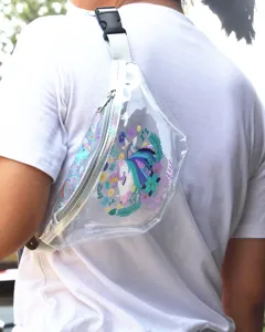 Detailed shot of transparent PVC waist bag with colorful unicorn print and floral design