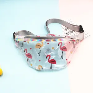Close-up of clear PVC fanny pack with pink flamingo prints and holographic trim