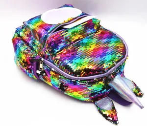 Detailed view of colorful rainbow sequins on unicorn-shaped backpack
