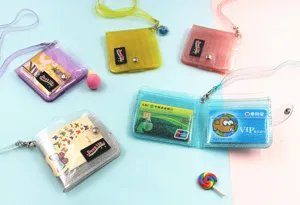 Detailed view of colorful glitter transparent PVC folding wallets with lanyards