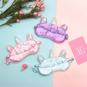 Plush unicorn sleep masks in pink, purple, and blue colors for girls and students.