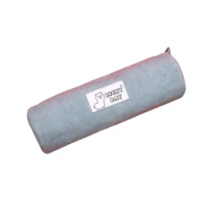 Minimalist light blue corduroy pencil case featuring a cute llama and Lucky Day label