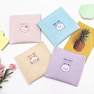 Detailed view of cute cartoon animal square storage pouches in pastel colors