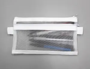 Detailed view of the double-layer white mesh pencil case showing fabric and transparency.