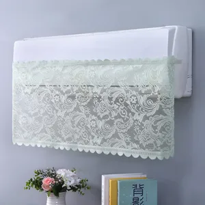 Dettaglio dell'elegante copertura antipolvere in pizzo verde menta per condizionatore
