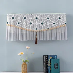 Elegante copertura antipolvere per climatizzatore con ricamo a fiocco e nappa decorativa
