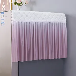 Detail view of a refrigerator dust cover featuring a quilted white top and pink gradient ruff.