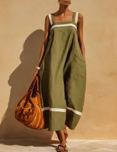 Detail view of a green linen sleeveless maxi dress with white horizontal stripe accents