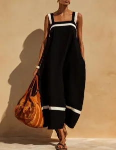 Detailed view of a sleeveless cotton-linen maxi dress with square neck and stripes.