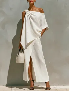 Detailed view of the elegant one-shoulder knot and front slit design on white linen-blend set.
