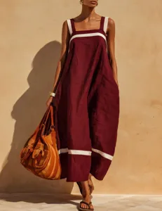 Detail view of a maroon cotton-linen maxi dress with white striped square neckline.