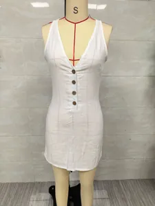 Front view of a white sleeveless V-neck mini dress with button details on a mannequin