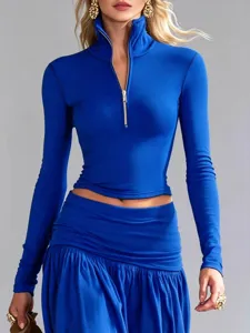 Elegant royal blue long sleeve half-zip top and matching low-waist maxi skirt set