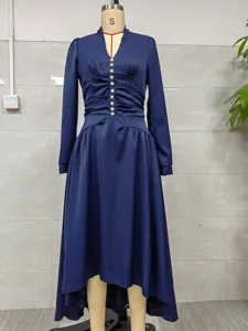 Elegant navy blue V-neck dress with ruched waist and long bubble sleeves on a mannequin
