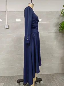 Side view of an elegant navy blue V-neck maxi dress with pleated waist and long sleeves