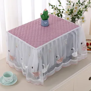 Quilted lace microwave cover with elegant swan embroidery detail