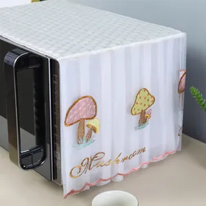 White lace microwave oven dust cover with cute embroidered mushrooms and lettering