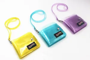 Three transparent glitter PVC neck wallets in yellow blue and purple colors for girls