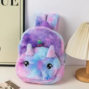Detailed view of a soft tie-dye plush unicorn backpack with cute large eyes