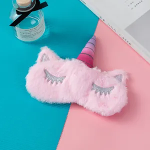 Cute pink plush unicorn sleep eye mask with soft furry texture and silver horn