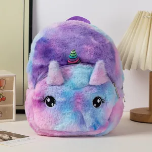 Front view of a plush tie-dye unicorn backpack with cute big eyes and a striped colorful horn