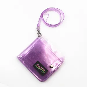 Close-up of a purple glitter transparent PVC wallet with a matching lanyard.