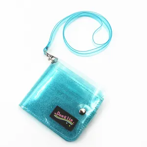 Blue glitter transparent PVC wallet detail showing folding design and lanyard strap