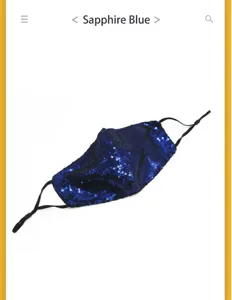 Close-up detail of a breathable royal blue sequin face mask with adjustable ear loops