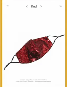 Close-up of a breathable red sequined face mask with adjustable black ear loops