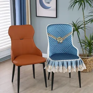 Detail of blue quilted chair cover with elegant lace trim and floral decoration