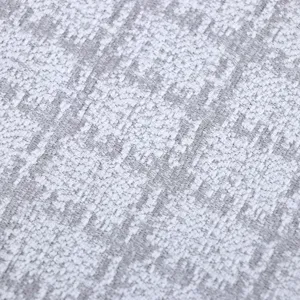 Gros plan macro détaillé sur le tissu gris texturé de haute qualité pour coussins de chaise.