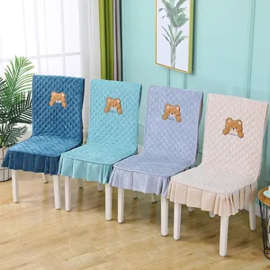 Set of four quilted velvet chair covers in varied colors with cute bear embroidery detail