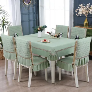 Elegant light green quilted dining chair covers and matching tablecloth set for home
