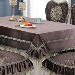 Close-up detail of European style velvet tablecloth and chair covers with lace trim