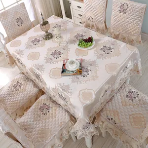 Elegant European floral tablecloth and matching chair cover set in champagne jacquard.