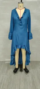 Detailed view of blue Bohemian ruffled dress with asymmetrical hem on mannequin