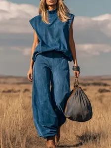 Ensemble haut sans manches et pantalon large en daim bleu style western élégant