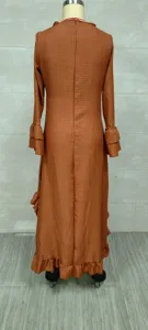 Back view of bohemian long sleeve maxi dress with ruffle hem and tiered cuff details