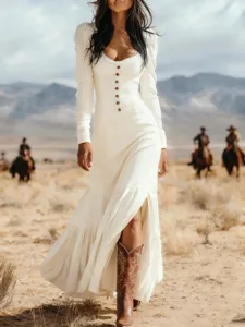 Elegant vintage western style long sleeve white button maxi dress in desert setting