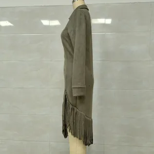 Detailed side view of western cowboy style olive green suede long sleeve dress with fringe tassels